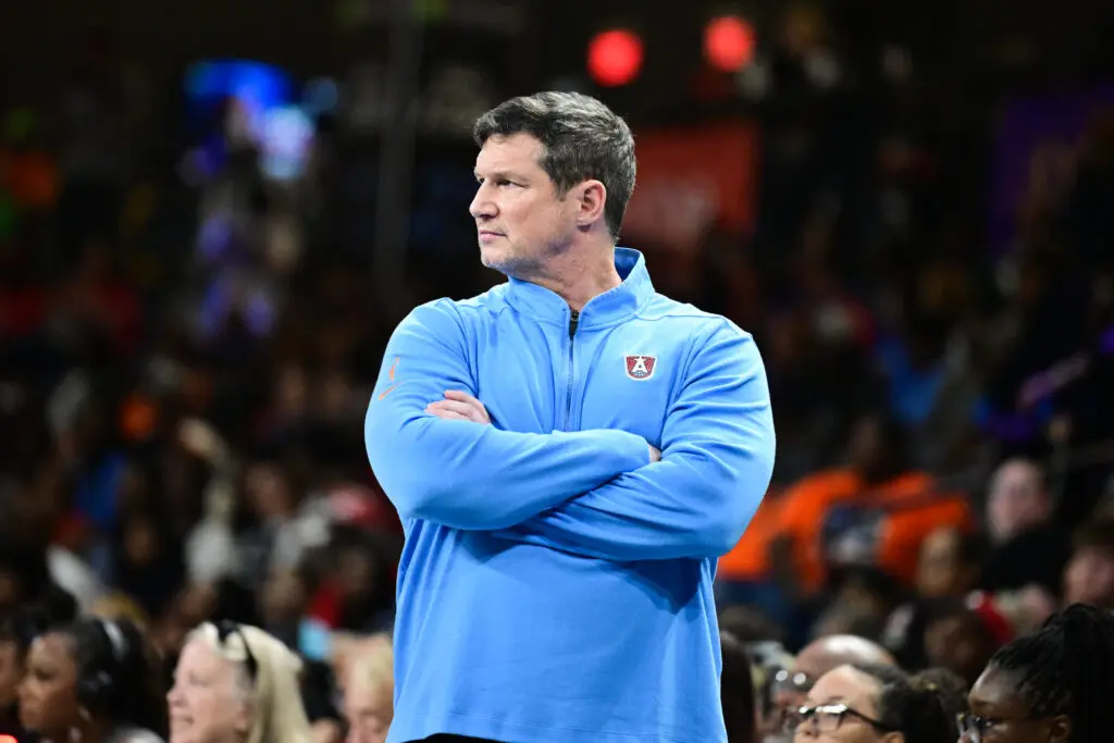Atlanta Dream head coach Karl Smesko looks on from the sideline during a 2025 WNBA game.