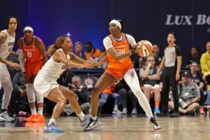 Connecticut Sun forward Aneesah Morrow controls the ball during a 2025 WNBA game.