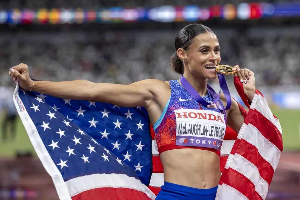 US track star Sydney McLaughlin-Levrone celebrates her 400-meter win at the 2025 World Athletics Championships.