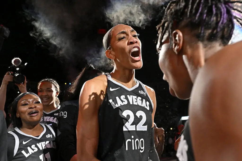 Las Vegas center A'ja Wilson celebrates the Aces' first-round series win in the 2025 WNBA Playoffs with her teammates.