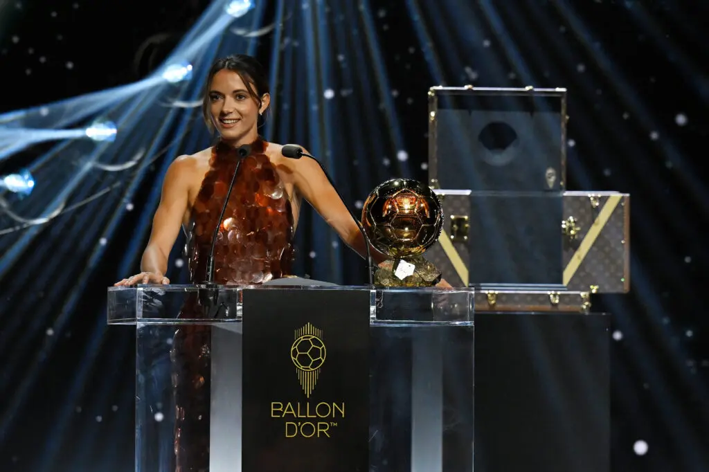 Spain and Barcelona midfielder Aitana Bonmatí accepts her third straight Ballon d'Or at the 2025 awards ceremony.