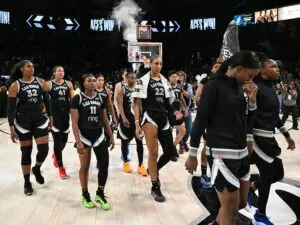 The Aces walk off the Las Vegas court after defeating the Indiana Fever in Game 2 of the 2025 WNBA semifinals.