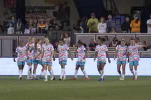 The San Diego Wave walk across the pitch during a 2025 NWSL match.