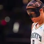 New York Liberty guard Natasha Cloud looks down during a 2025 WNBA game.