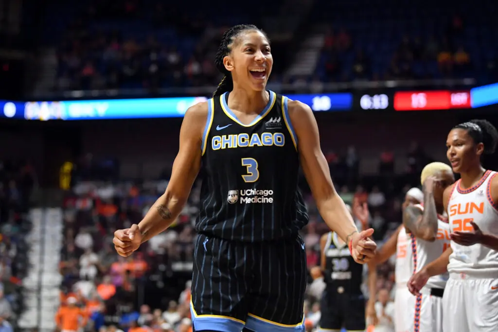 Chicago Sky star Candace Parker smiles during a 2022 WNBA semifinals game.