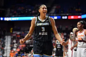Chicago Sky star Candace Parker smiles during a 2022 WNBA semifinals game.