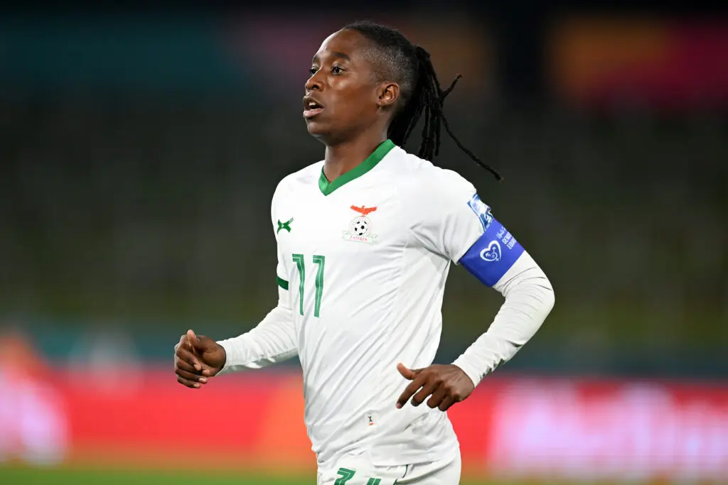 Zambia star striker Barbra Banda runs across the pitch during a 2023 World Cup match.