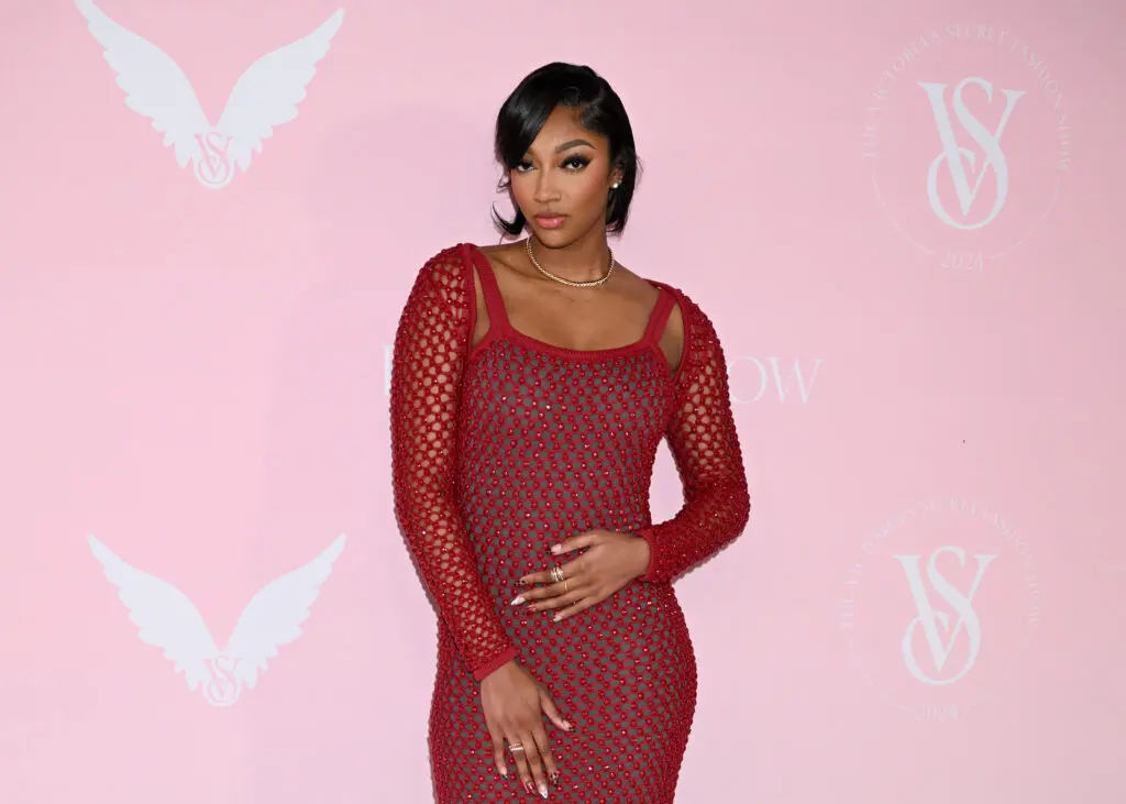 WNBA star Angel Reese poses for press before the 2024 Victoria's Secret Fashion Show.