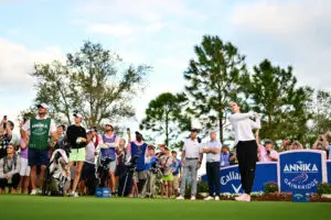 WNBA star Caitlin Clark tees off at The Annika Pro-Am in 2024.
