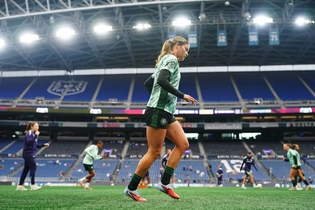 Racing Louisville forward Emma Sears warms up before a 2025 NWSL match.