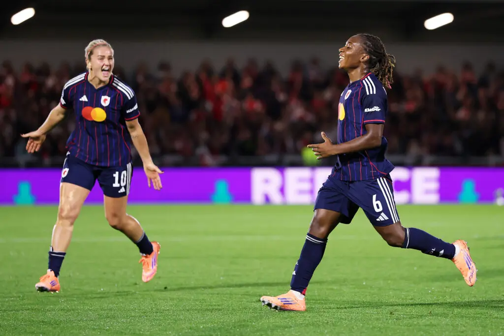 OL Lyonnes attacker Melchie Dumornay and midfielder Lindsey Heaps celebrate one of Dumornay's two goals during their league phase opener in 2025/26 Champions League play.