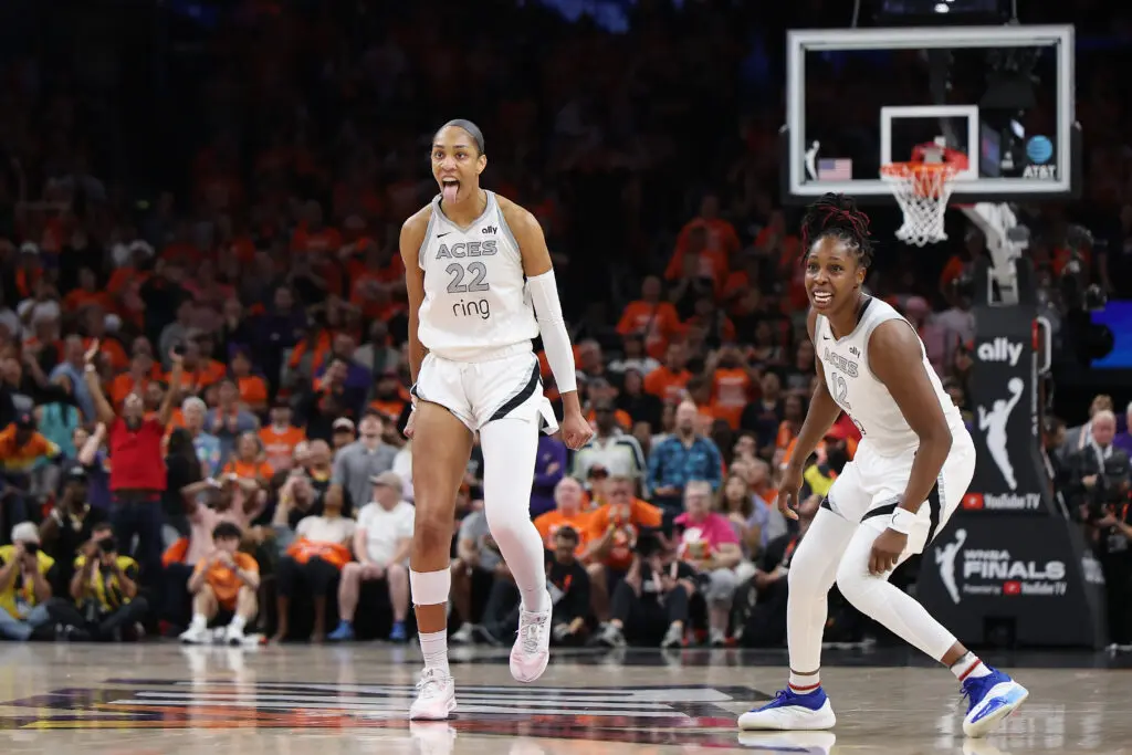 Las Vegas Aces stars A'ja Wilson and Chelsea Gray react to Wilson's game-winning shot in Game 3 of the 2025 WNBA Finals.