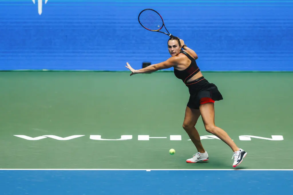 Top-ranked tennis star Aryna Sabalenka preps her return during the 2025 Wuhan Open quarterfinals.