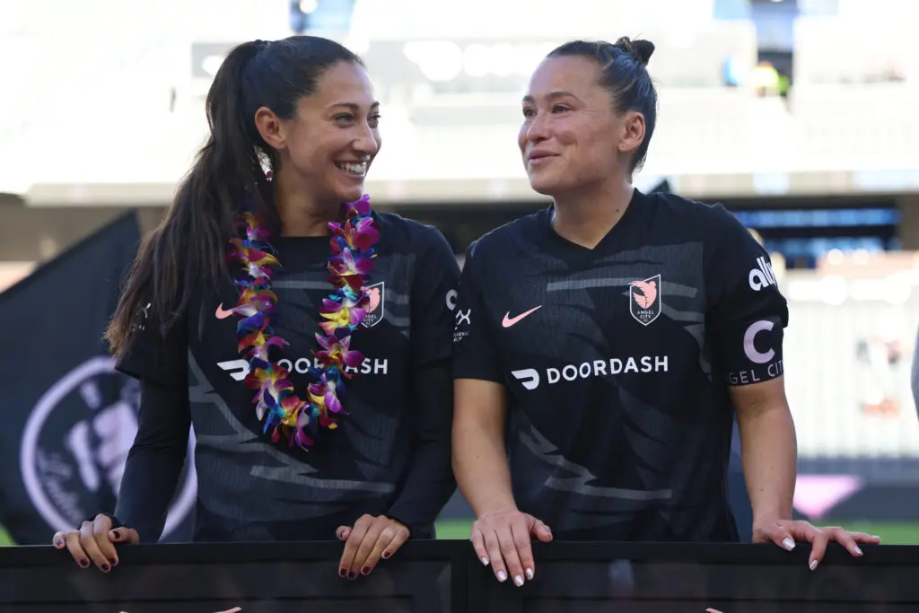 Angel City stars Christen Press and Ali Riley react during their retirement ceremony after a 2025 NWSL match.
