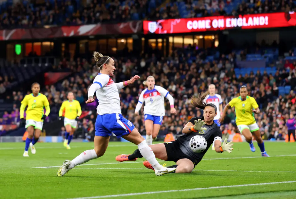 England defender Lucy Bronze tries to tap in a goal past Brazil keeper Lorena during an October 2025 friendly.