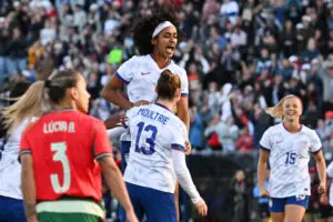 USWNT midfielder Lily Yohannes jumps to celebrate a goal from midfielder Olivia Moultrie during a 2025 friendly.