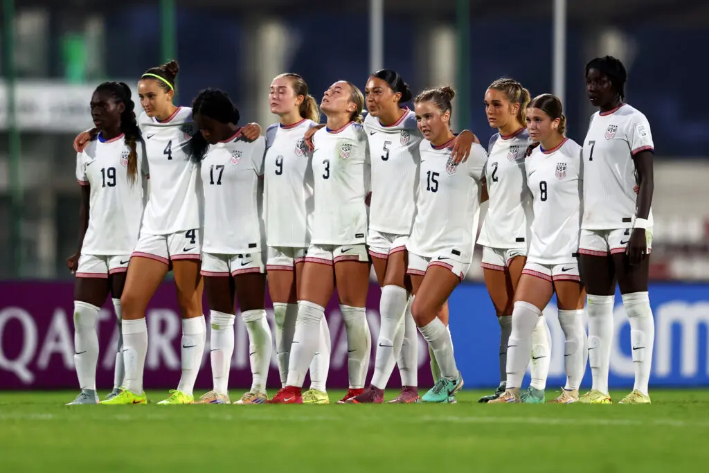 USWNT U-17 players watch during a penalty shootout at the 2025 FIFA U-17 World Cup.