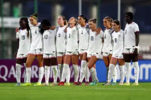 USWNT U-17 players watch during a penalty shootout at the 2025 FIFA U-17 World Cup.