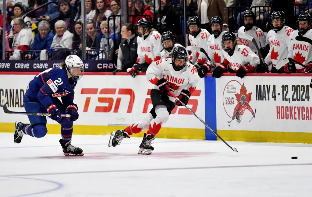 USA hockey star Hilary Knight chases Canada forward Emily Clark across the ice during the 2024 IIHF Women's World Championship final.