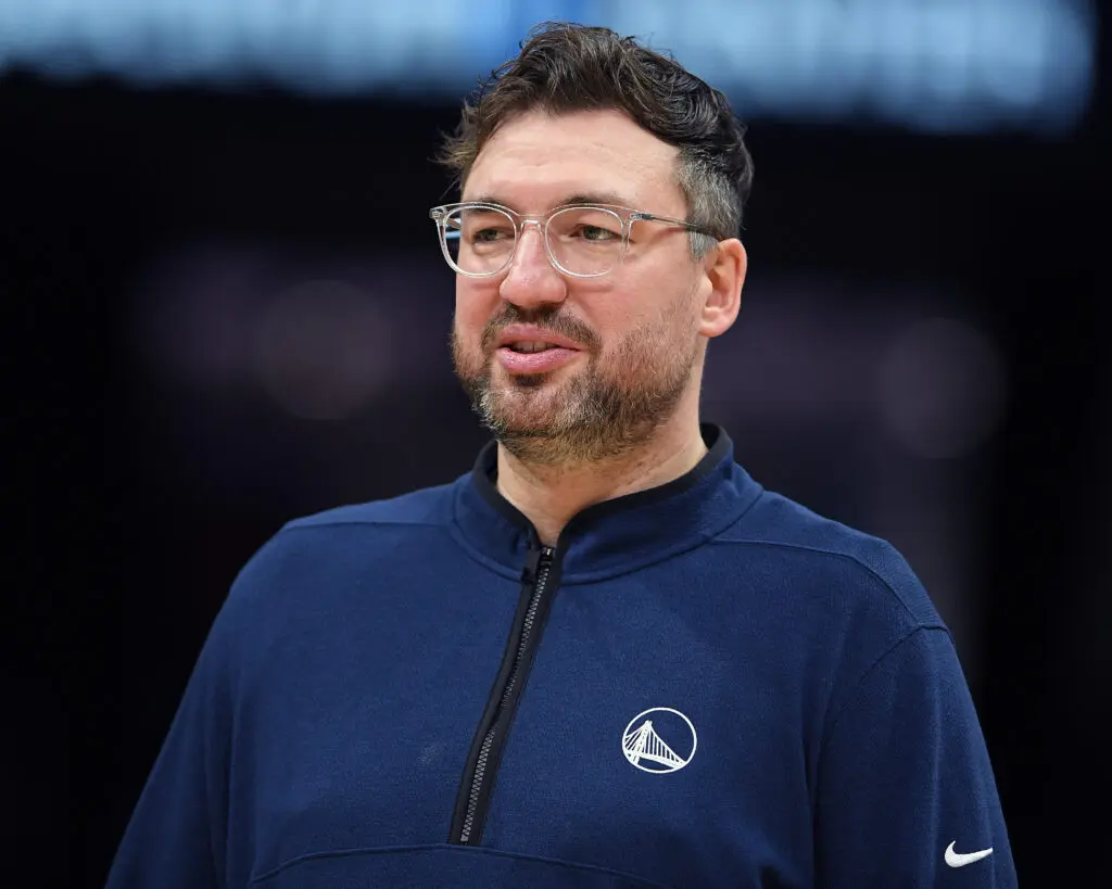 Golden State Warriors assistant coach Chris DeMarco looks on during a 2024/25 NBA game.