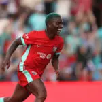 Kansas City Current forward Temwa Chawinga celebrates a goal in a 2025 NWSL match.