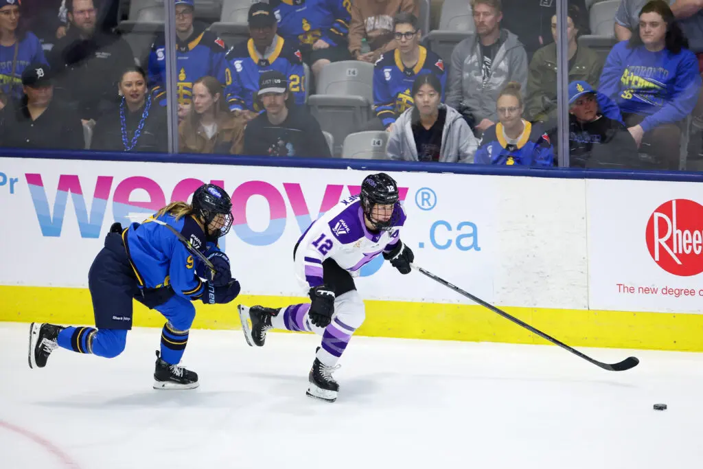 A Toronto Sceptres player chases Minnesota Frost forward Kelly Pannek during a first-round game in the 2025 PWHL Playoffs.