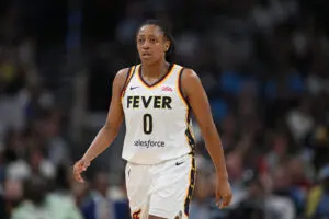 Indiana Fever guard Kelsey Mitchell looks on during a 2025 WNBA game.