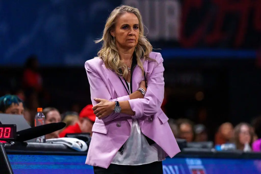 Las Vegas Aces head coach Becky Hammon watches from the sideline during a 2025 WNBA game.
