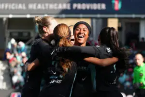 Jaedyn Shaw #2 of NJ/NY Gotham FC celebrates with teammates after scoring the team's first goal during the quarterfinal match between Kansas City Current and NJ/NY Gotham FC as part of the 2025 NWSL Playoffs at CPKC Stadium on November 09, 2025 in Kansas City, Missouri.