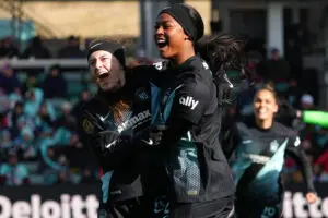 Gotham FC midfielder Rose Lavelle and attacker Jaedyn Shaw celebrate Shaw's goal in the 2025 NWSL quarterfinals.