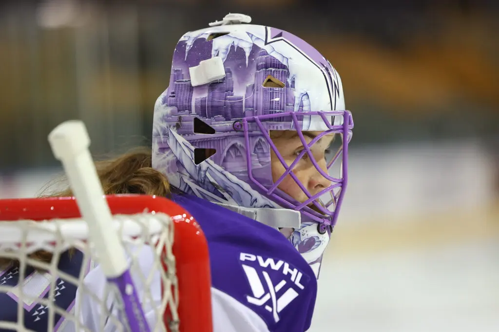 A close-up of Minnesota Frost goaltender Nicole Hensley defending the net during a 2025/26 PWHL preseason scrimmage.