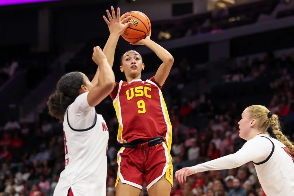 USC freshman Jazzy Davidson shoots over a NC State defender during a 2025/26 NCAA basketball game.