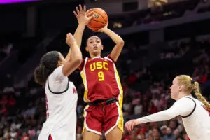 USC freshman Jazzy Davidson shoots over a NC State defender during a 2025/26 NCAA basketball game.