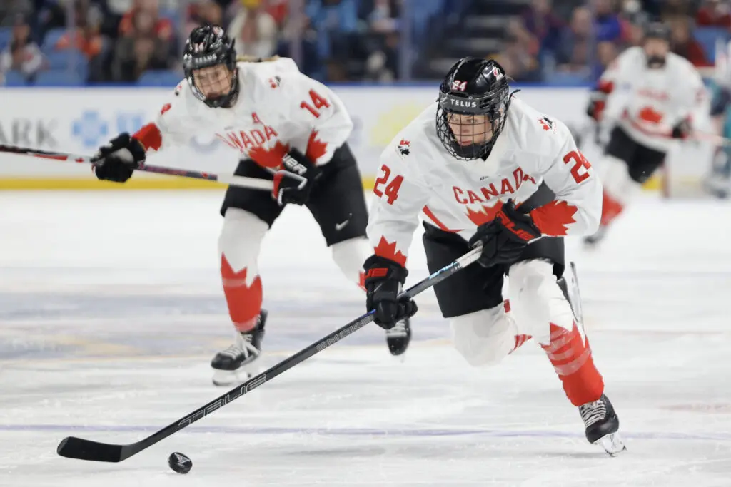 Canadahockey star Natalie Spooner skates with the puck during a 2025 Rivalry Series game in Buffalo, New York.
