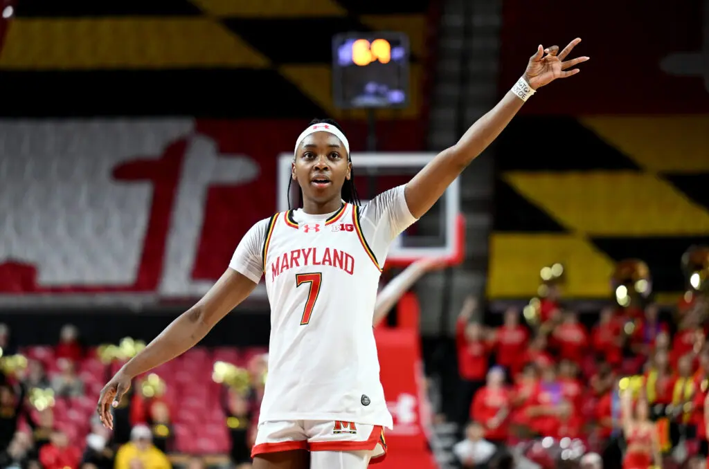 Maryland guard Oluchi Okananwa celebrates a three-point shot during a 2025/26 NCAA basketball game.