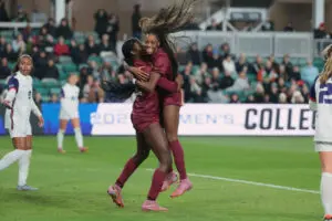 Florida State forward Wrianna Hudson celebrates a goal with forward Jordynn Dudley during the 2025 College Cup semifinals.