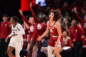 Oklahoma guard Aaliyah Chavez celebrates a play during a 2025/26 NCAA basketball game.