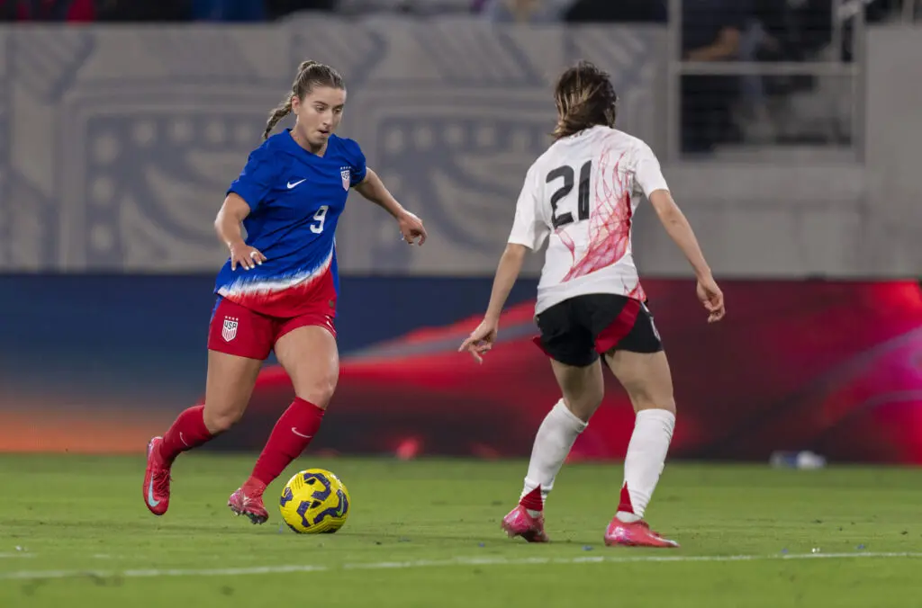 USWNT attacker Ally Sentnor dribbles the ball during the 2025 SheBelieves Cup final against Japan.