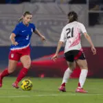 USWNT attacker Ally Sentnor dribbles the ball during the 2025 SheBelieves Cup final against Japan.