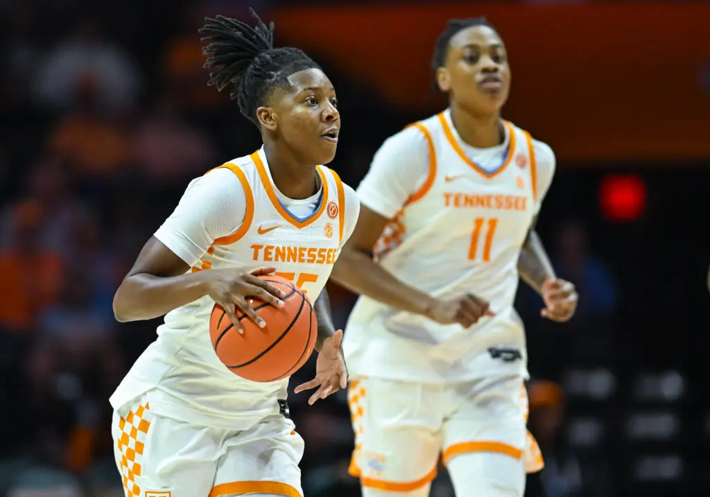 Tennessee guard Talaysia Cooper brings the ball up the court as forward Zee Spearman follows during a 2025/26 NCAA basketball game.
