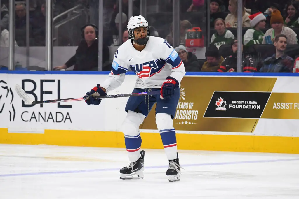 Young Team USA hockey star Laila Edwards looks down the ice during a 2025 Rivalry Series game.