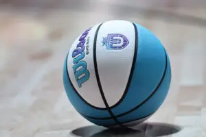 An Unrivaled basketball rests on the court.