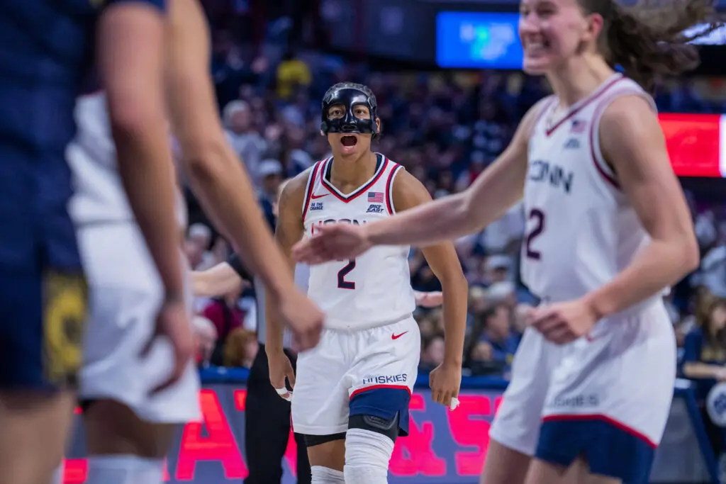 UConn junior guard KK Arnold reacts to a play during a 2025/26 NCAA basketball game against Notre Dame.