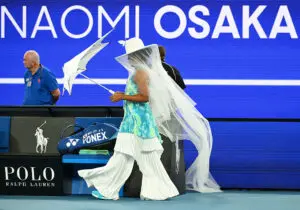 Naomi Osaka of Japan walks out ahead of the Women's Singles First Round match against Antonia Ruzic of Croatia on day three of the 2026 Australian Open at Melbourne Park on January 20, 2026 in Melbourne, Australia.
