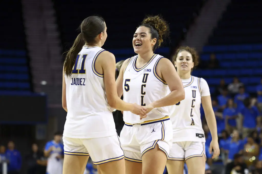 UCLA guards Gabi Jaquez and Charlisse Leger-Walker celebrate a play during a 2025/26 NCAA basketball game.