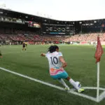 San Diego Wave midfielder Kenza Dali launches a corner kick during a 2025 NWSL quarterfinals match.