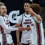 Ahead of the South Carolina vs Texas A&M game, Tessa Johnson #5, Joyce Edwards #8, and Maddy McDaniel #1 of the South Carolina Gamecocks react in the second half against the Vanderbilt Commodores during their game at Colonial Life Arena on January 25, 2026 in Columbia, South Carolina.