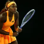 US tennis star Coco Gauff awaits a serve from Elina Svitolina during their 2026 Australian Open quarterfinal match.