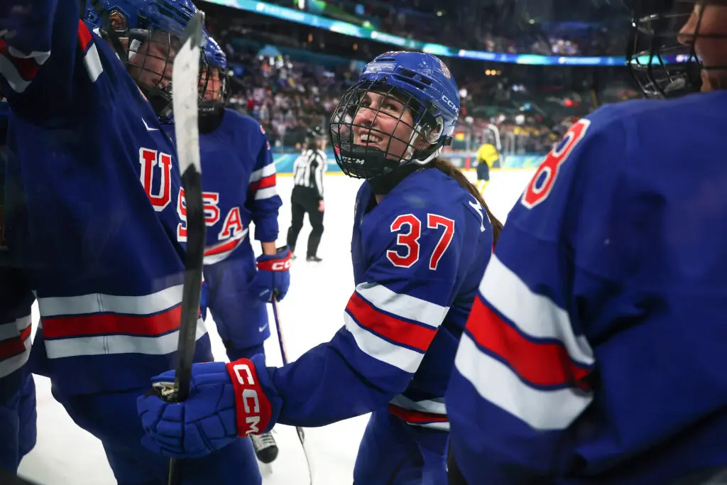 USA hockey forward Abbey Murphy celebrates her goal with teammates during their 2026 Winter Olympics semifinals win.