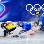 Courtney Sarault of Canada and crash Kamila Sellier-Stormowska of Poland and Arianna Fontana of Italy and Kristen Santos-Griswold of United States of America competing on the Short Track Speed Skating Women's 1500m Quarterfinals on day fourteen of the Milano Cortina 2026 Winter Olympics at Milano Speed Skating Stadium on February 20, 2026 in Milan, Italy.